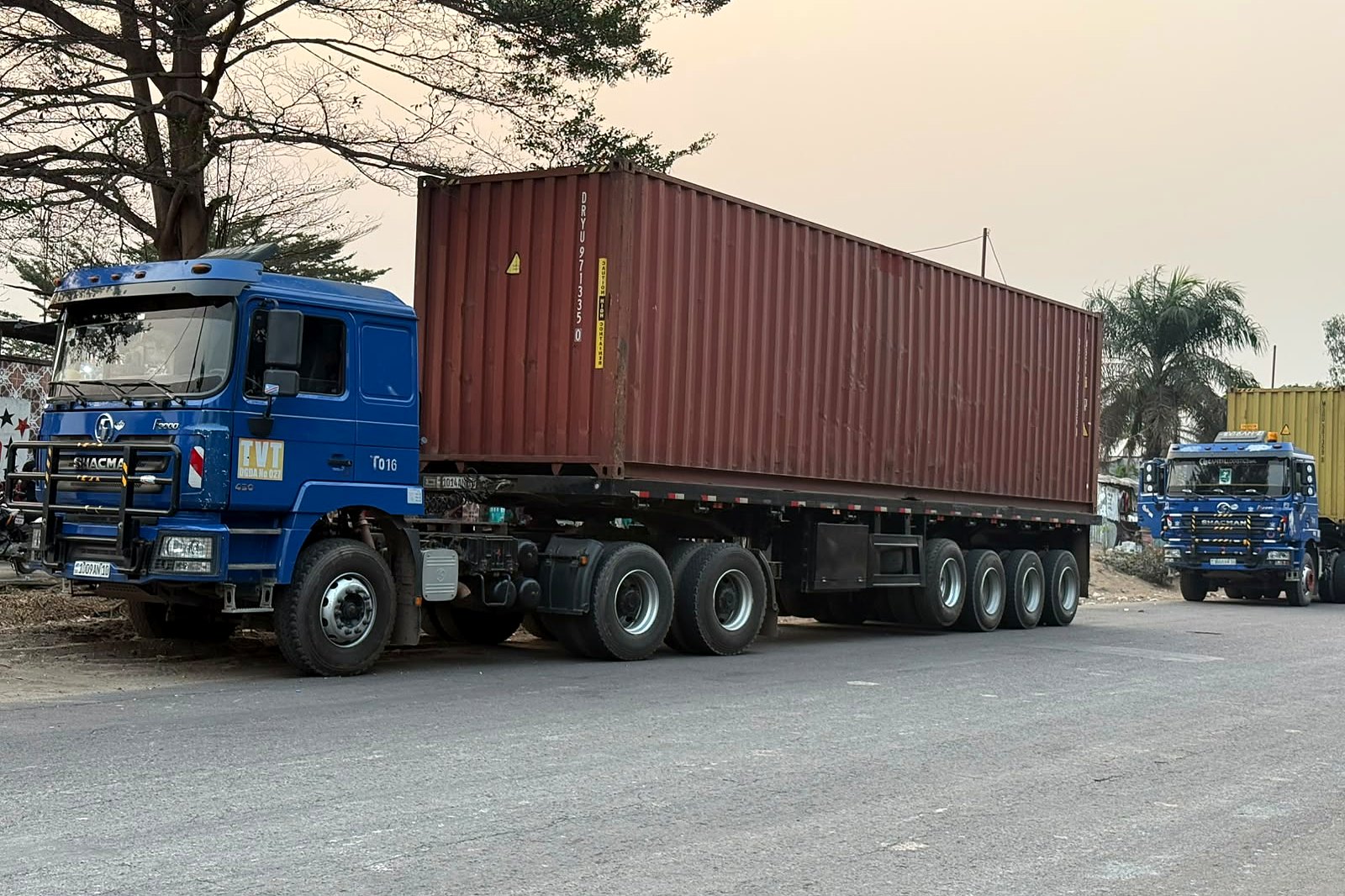 Capital Logistics SHACMAN truck hauling a container on the road